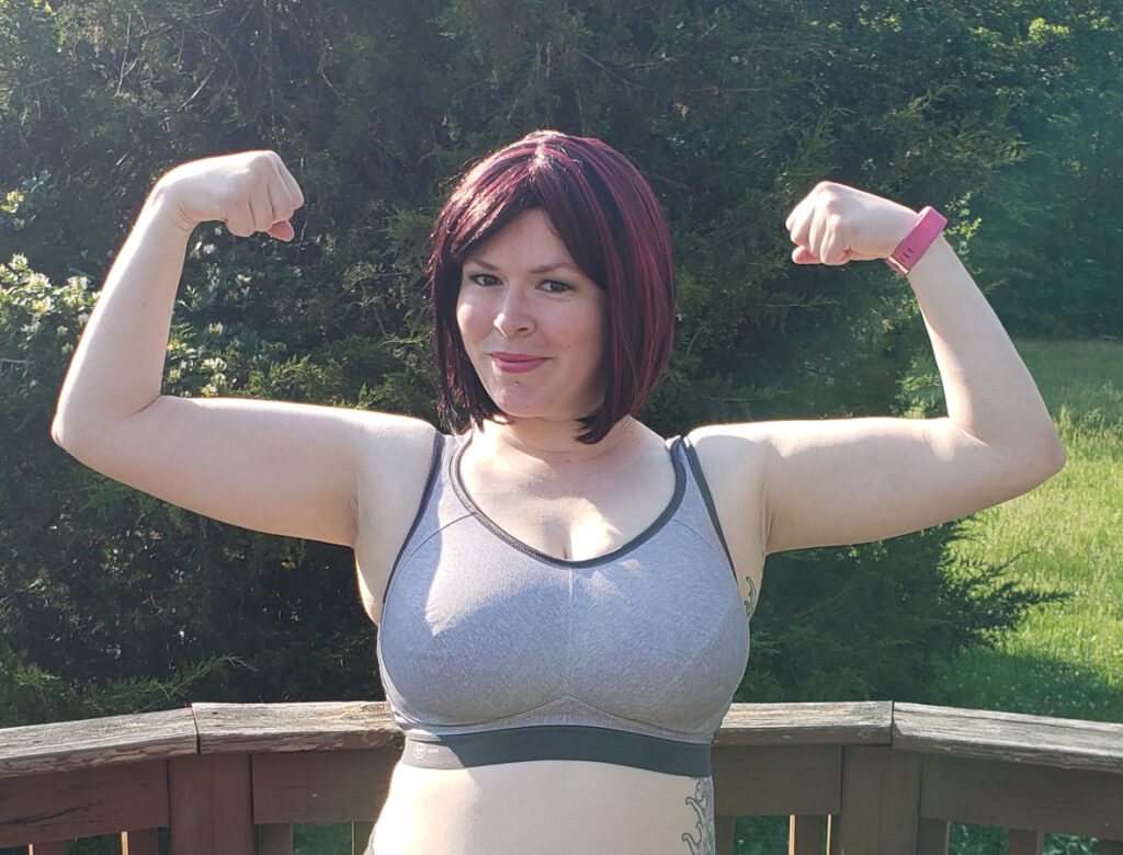Image of me goofing around with my arms flexed trying to show off muscle tone