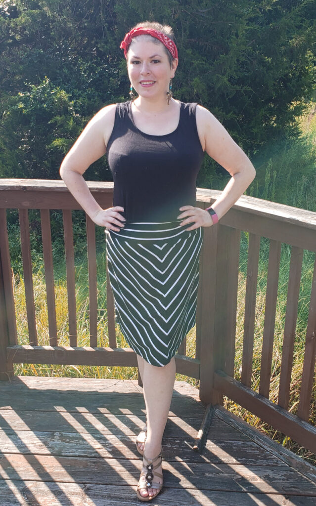Alternative front view of Exclusively Kristen tank tucked into a skirt