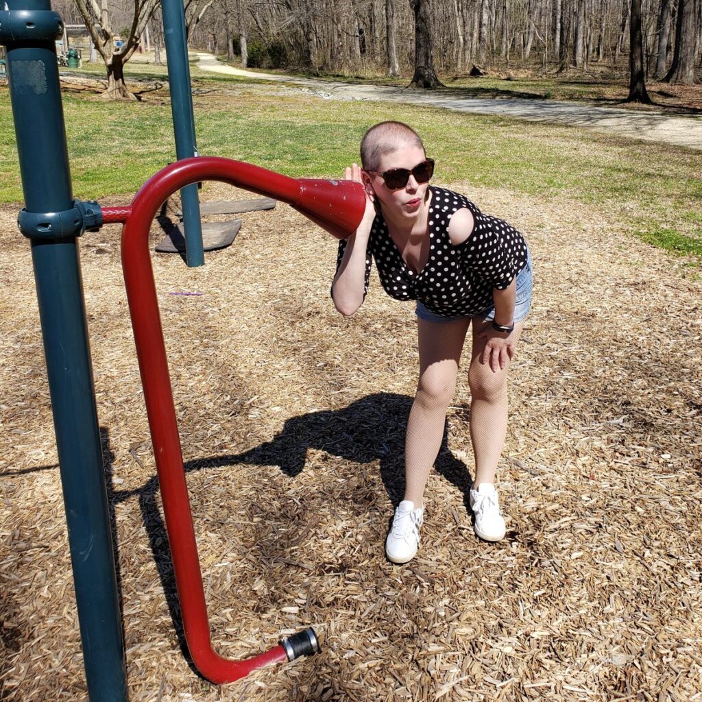 Me goofing off in the Twisted Top at the playground