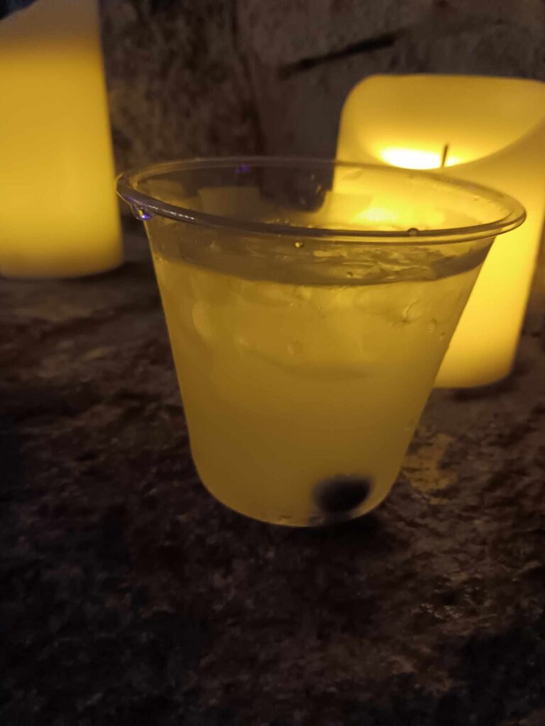 Image of the signature cocktail The Pale Blue eye from the Tell-Tale Heart performance