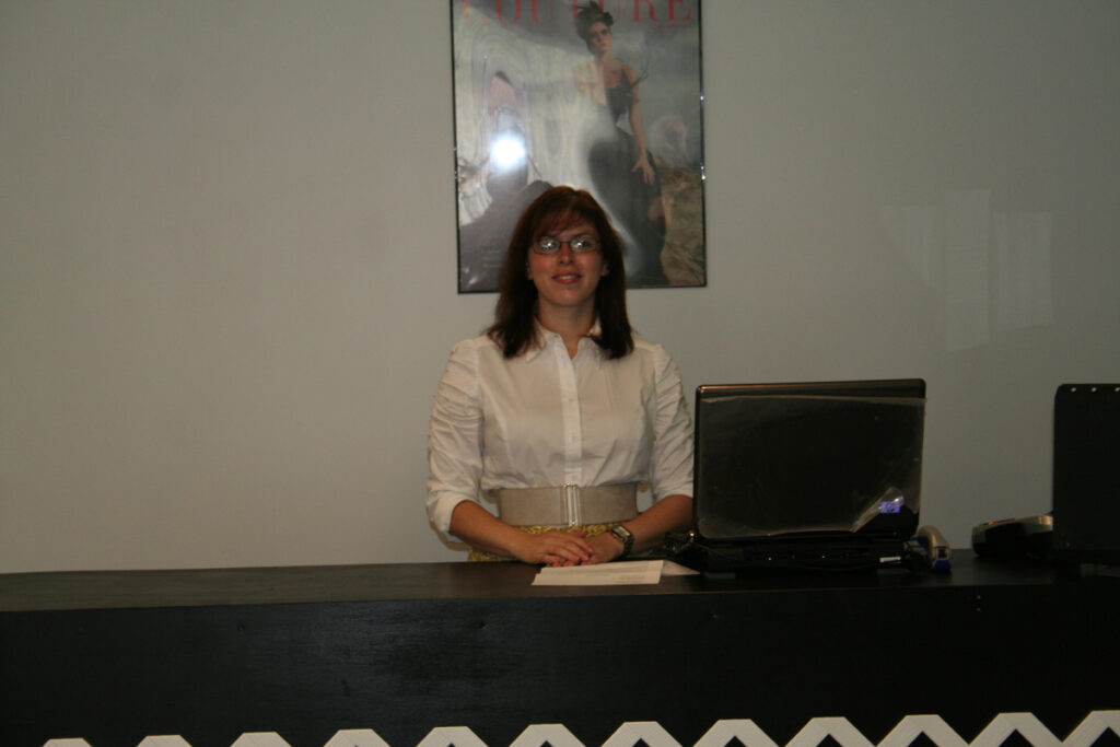An early photo of me at the checkout in the original store