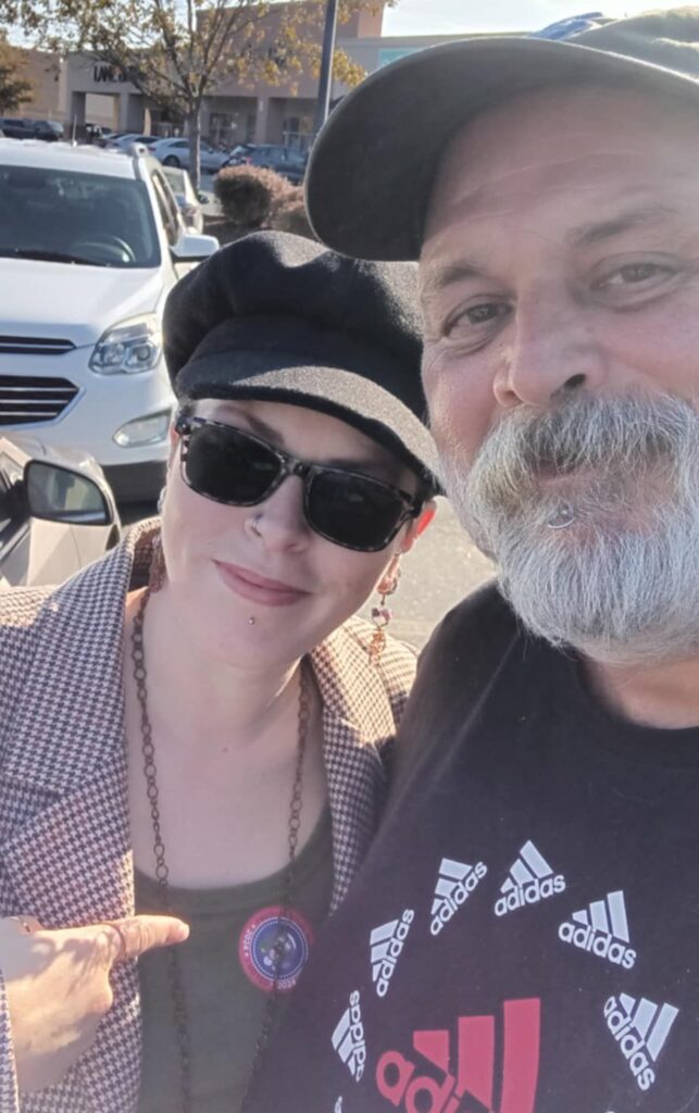 Photo of dad and me after voting in the election.